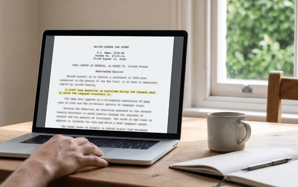 Laptop on a kitchen table showing a U.S. Tax Court opinion with one line highlighted, a hand resting beside it.